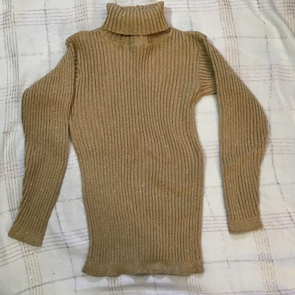 Attractive gold turtleneck sweater